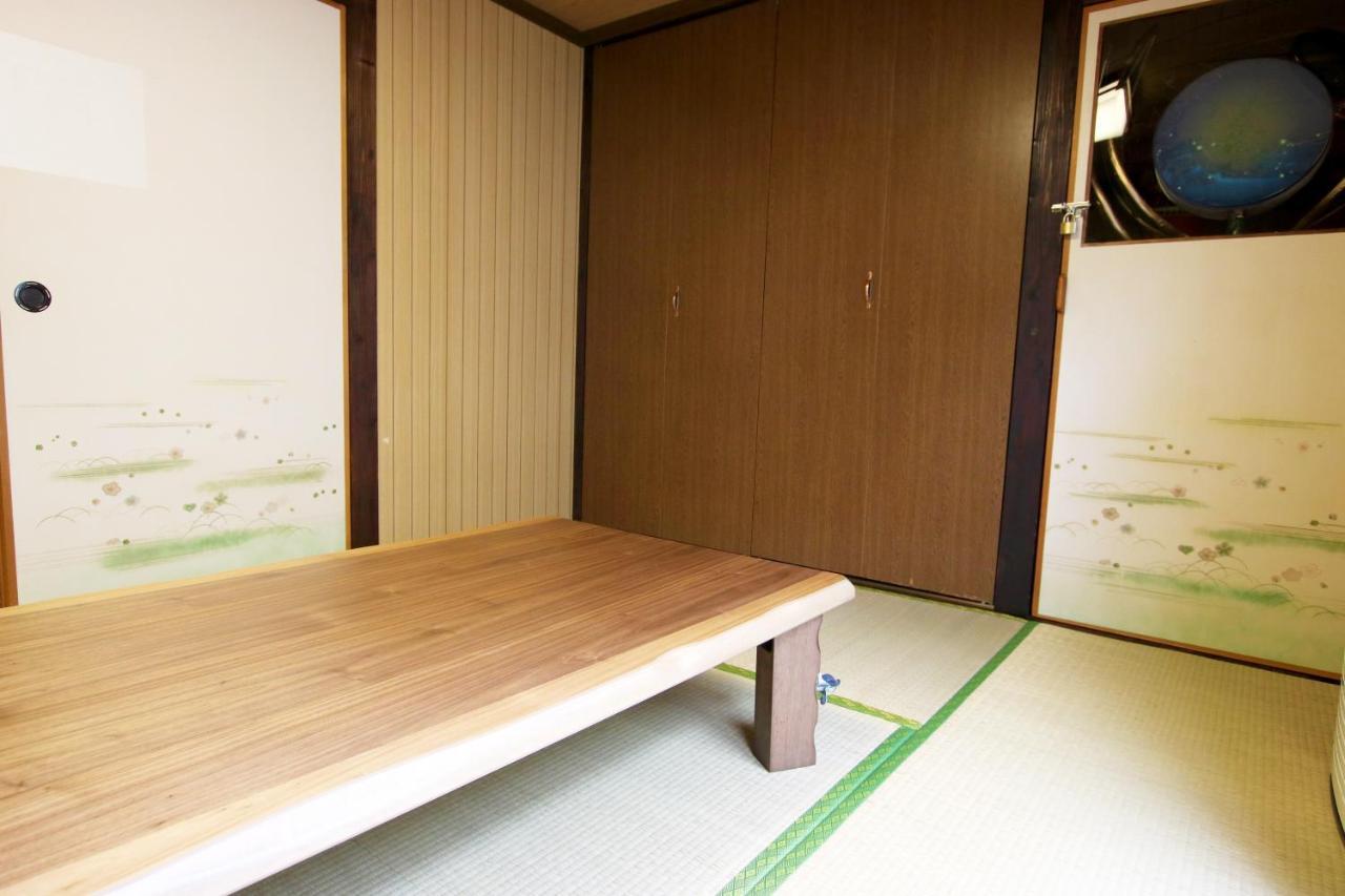 Okinawa Naha Jinjin -沖縄伝統体験型宿じんじん- Extérieur photo