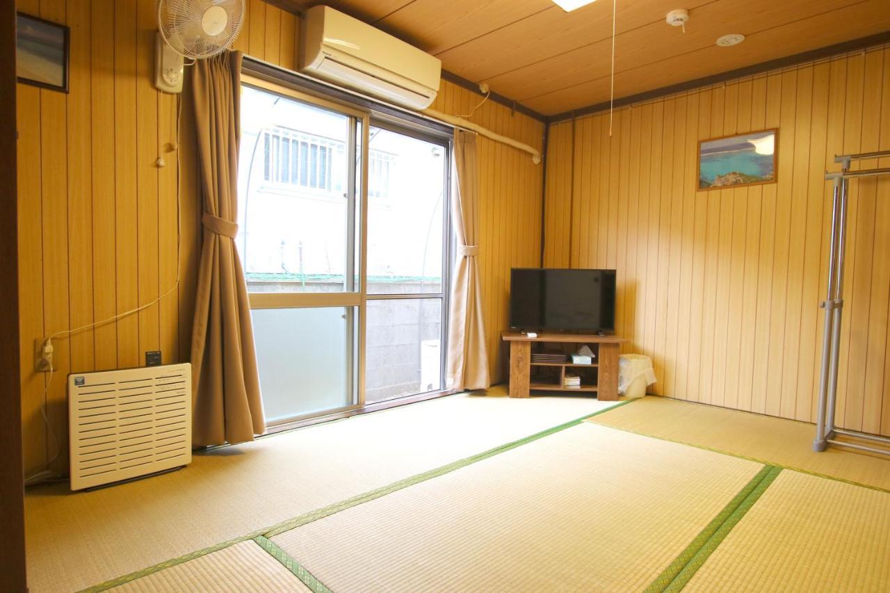 Okinawa Naha Jinjin -沖縄伝統体験型宿じんじん- Extérieur photo